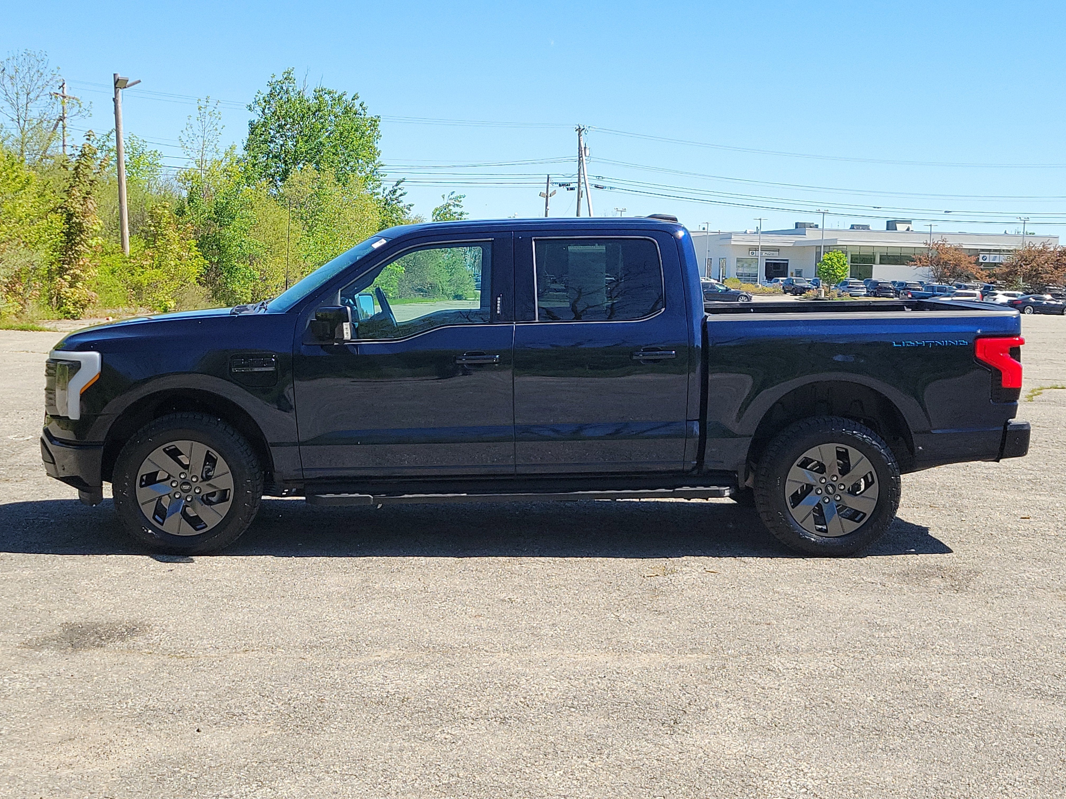 Used 2023 Ford F-150 Lightning Lariat with VIN 1FTVW1EL3PWG55273 for sale in Brunswick, ME