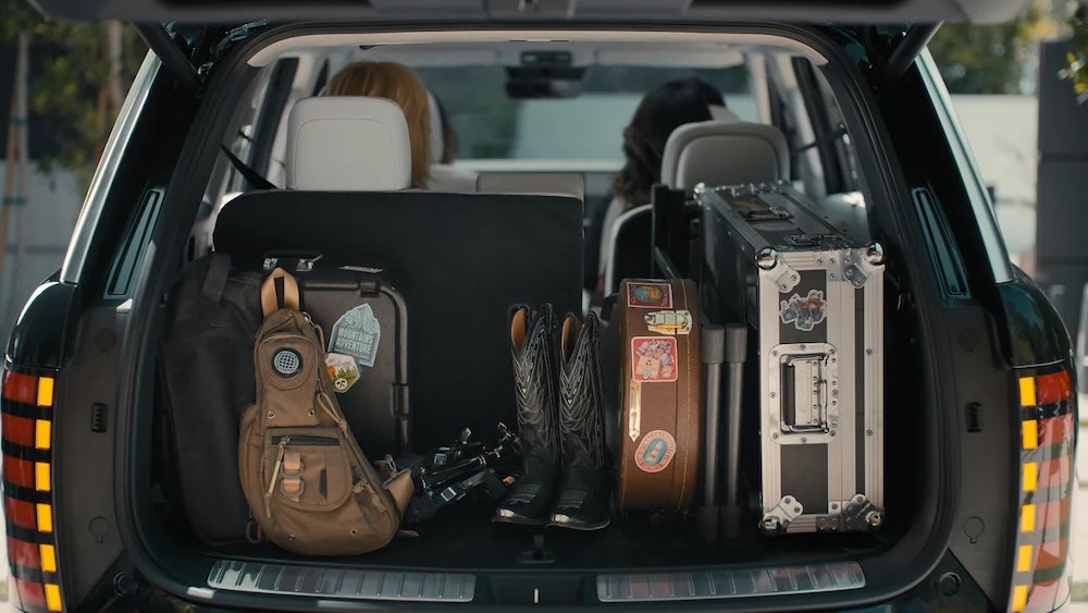 The cargo area of a 2026 Hyundai Palisade SUV, full of equipment